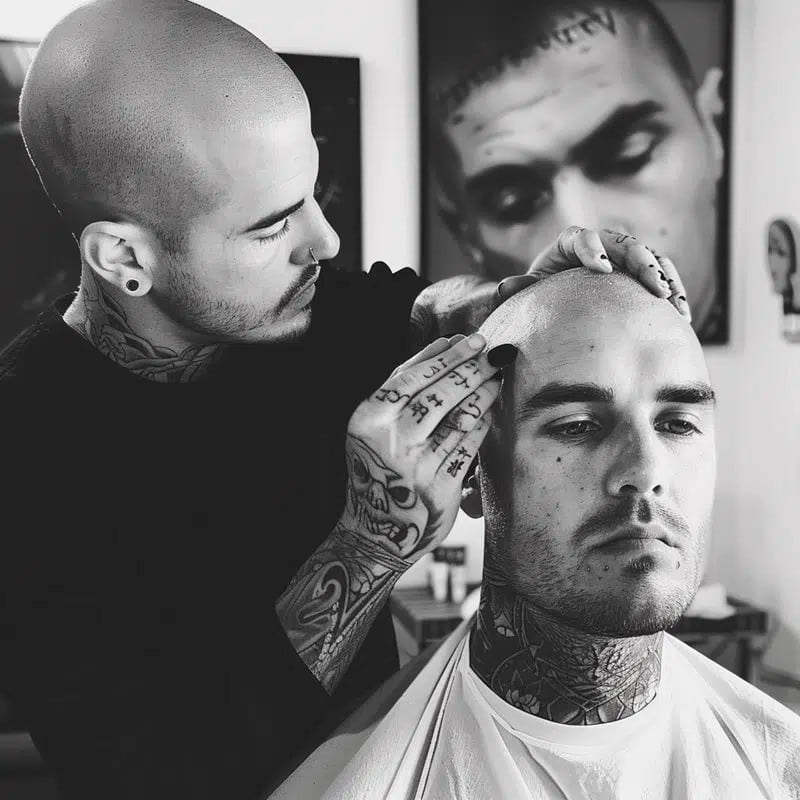 man-about-to-tattoo-his-head